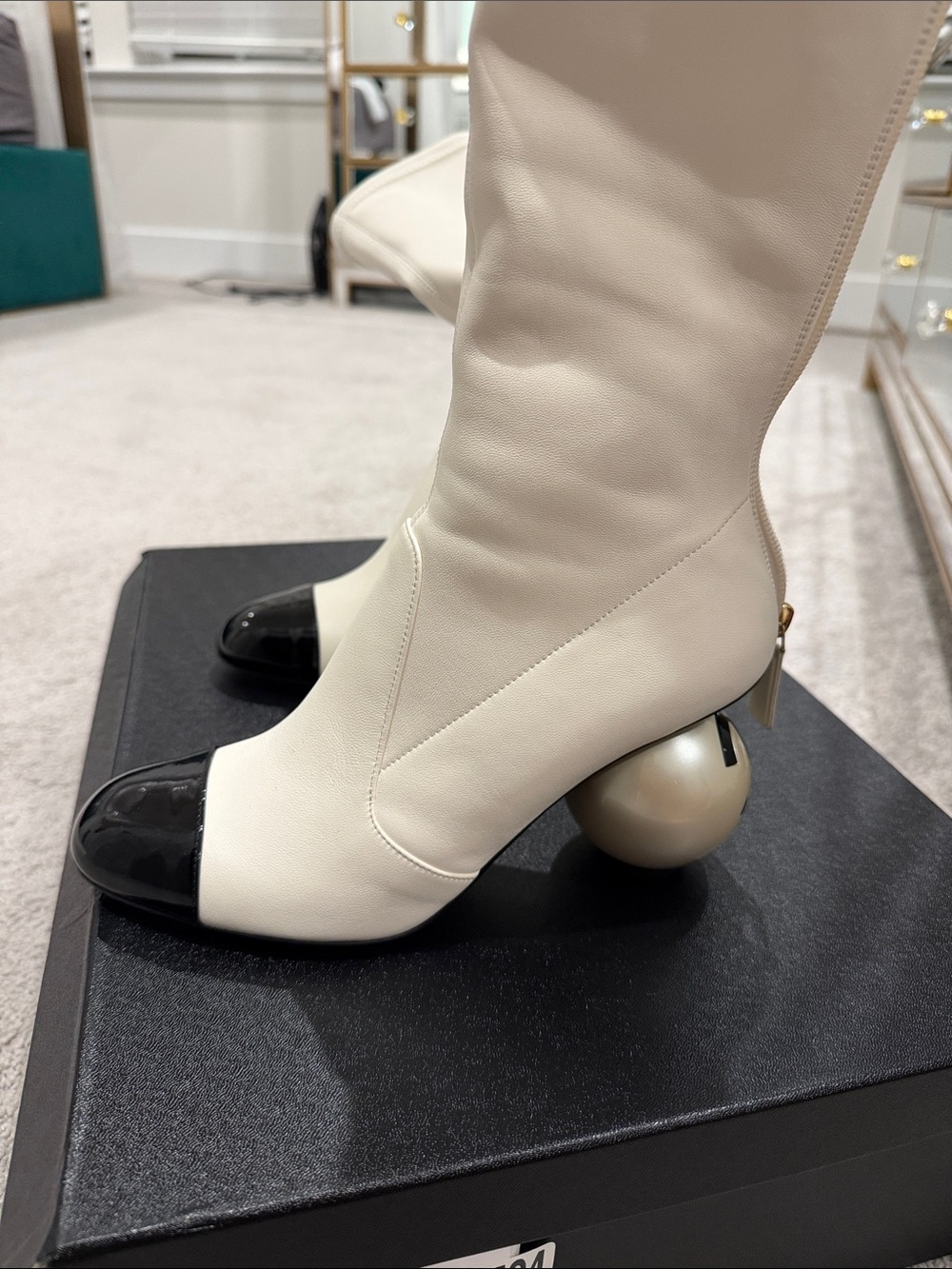 CHANEL Cream Leather Boots with Black Patent Cap Toe and Metallic Orb Heel